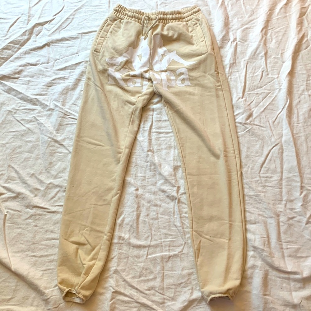 Cream colored kappa sweat pant , okay condition